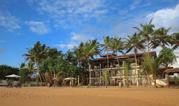 Whispering Palms Hotel