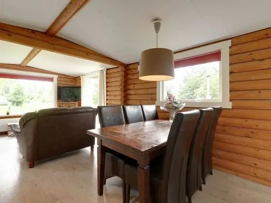 Wooden Tree Trunk Bungalow at Fish Pond in Hoge Hexel, Optional With hot tub