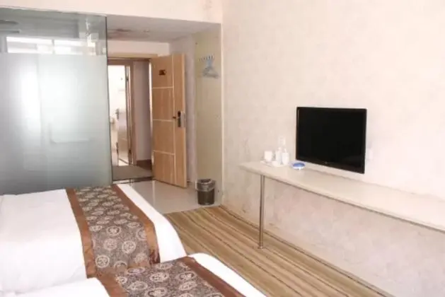 Xin Jia Yuan Business Hotel - Oda