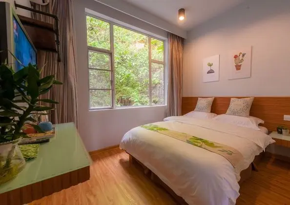 Yangshuo 9 Time Hotel - Oda