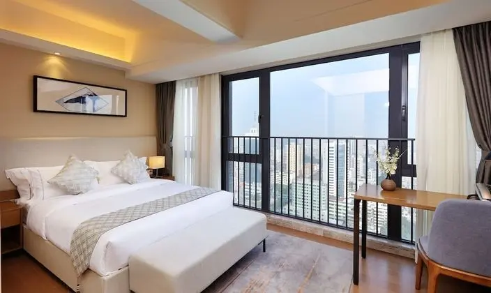 Yuwa Serviced ApartHotel - Oda