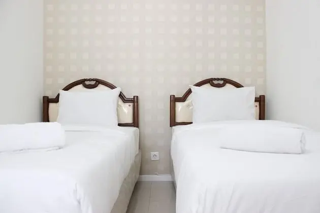 Zestful 2BR Apartment at Parahyangan Residence