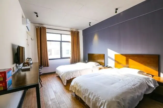 Zhangjiajie Comma Travel Hotel - Oda