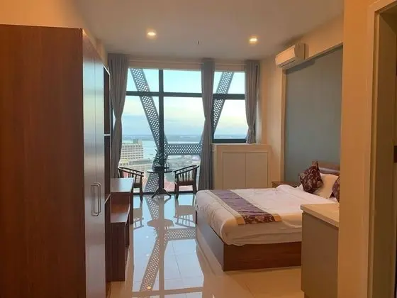 Zhongxin Holiday Hotel - Oda