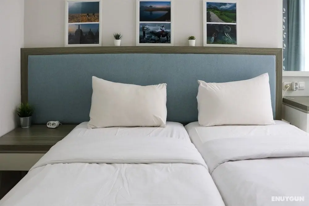 Comfort and Elegant 1BR at Gold Coast Apartment - Oda
