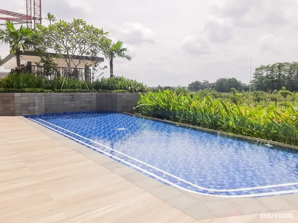 Comfortable 1BR Apartment at Marigold Nava Park - Havuz