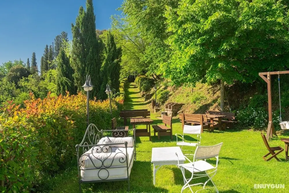 Holiday Home Features a Garden Features and Free Wifi - Öne Çıkan Resim