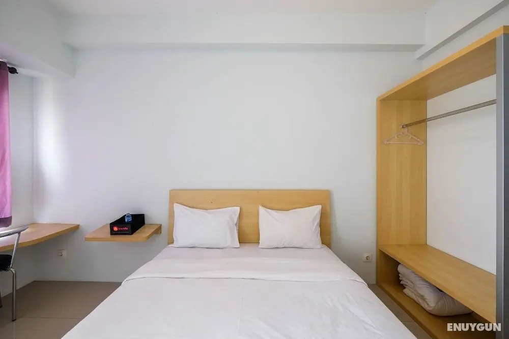 Homey and Comfy Studio Tamansari Mahogany Apartment - Oda