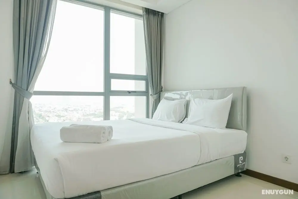 Homey with Private Lift 2BR Apartment at St. Moritz Puri near Mall - Oda
