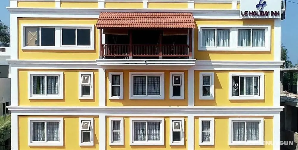 Le Holiday Inn - Öne Çıkan Resim