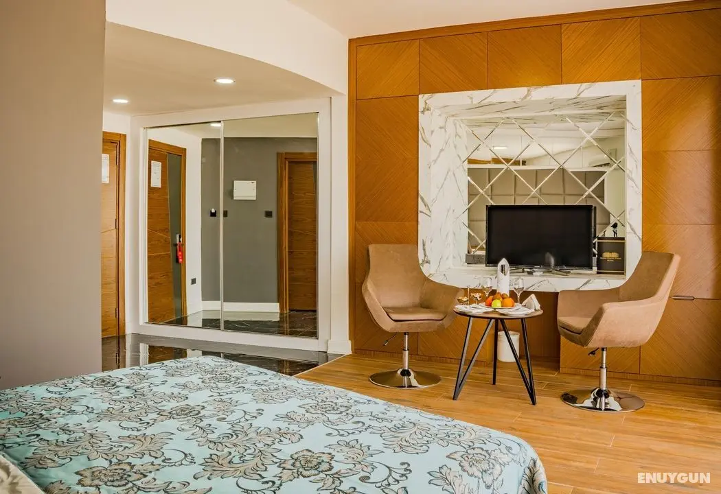 Novel Centre Point Hotel - Oda