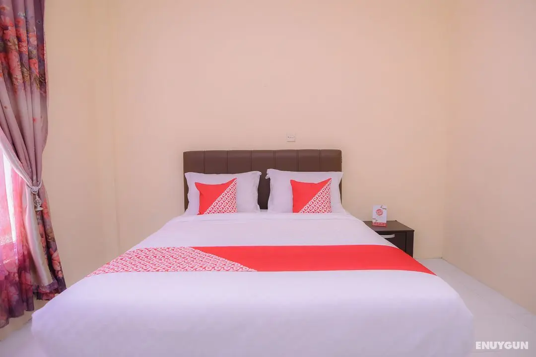 OYO 884 Rumoh PMI Hotel - Oda