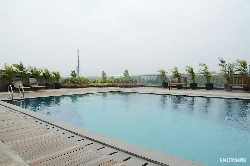 Spacious and Cozy 1BR at Tree Park Apartment - Dış Mekan