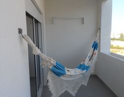 Apartamento Praia de Porches,izibookings Oda Düzeni