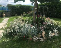 Au Jardin Fleuri Genel