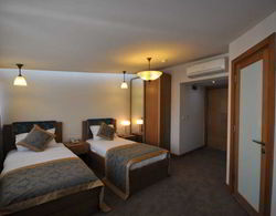 Cumbali Suite Hotel Oda