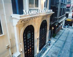 Maroon Hotel TomTom Genel