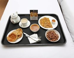 OYO 13000 Hotel Utsav Residency Kahvaltı