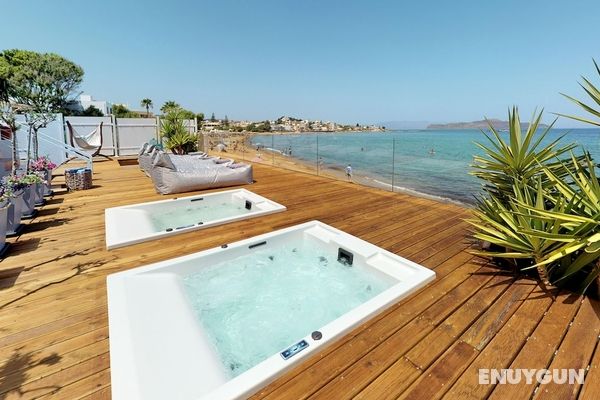 Beachfront Modern Property With 2 Outdoor hot Tubs Only 300m From Restaurants Shops Oda