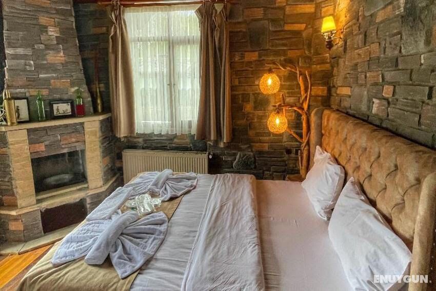 Corner Double Room with Fireplace, Lake View and Balcony