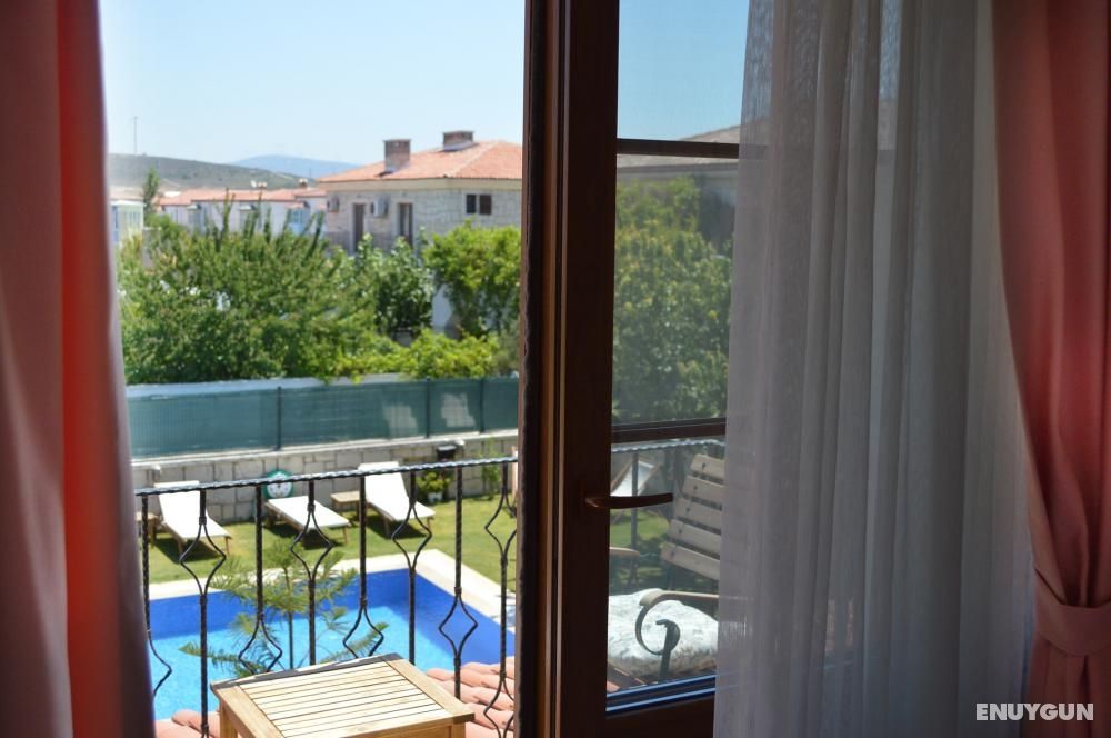 Deluxe Room with Balcony and Pool View
