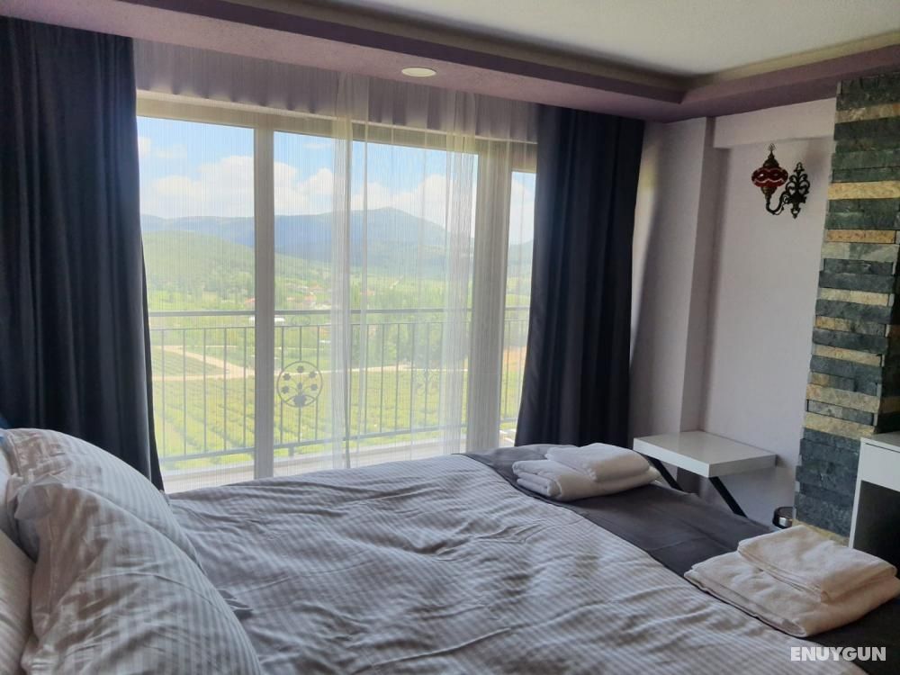 Suite with Nature View, Fireplace and Balcony