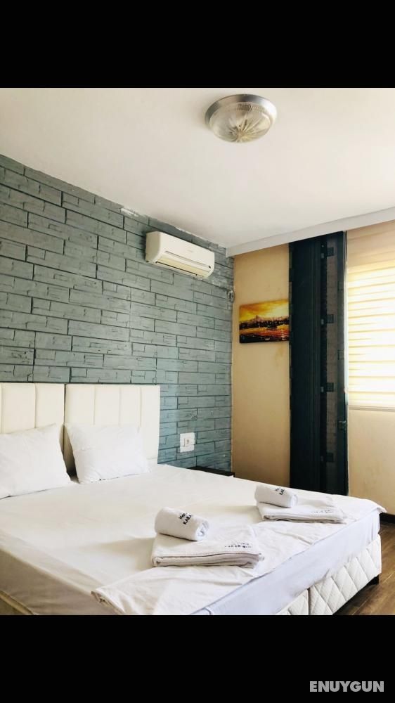 Standard Room with Garden View and Balcony