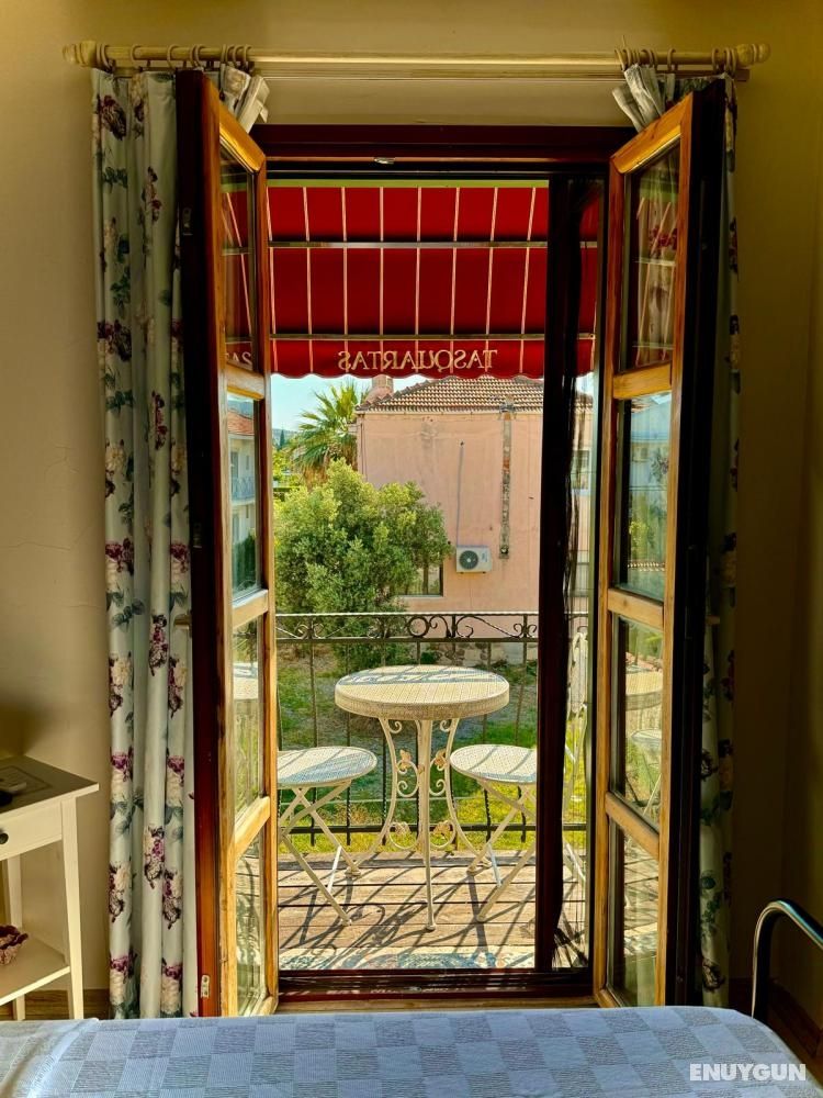 Room with Balcony and City View