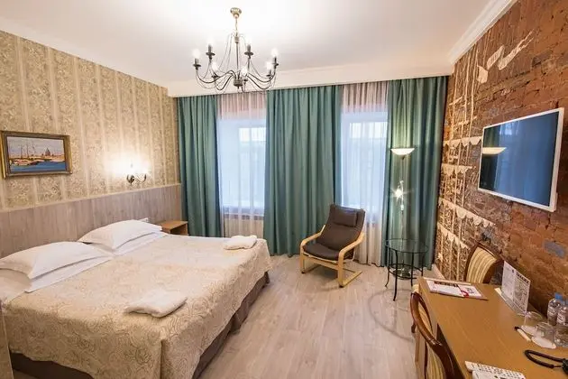 Deluxe Tek Büyük veya İki Ayrı Yataklı Oda