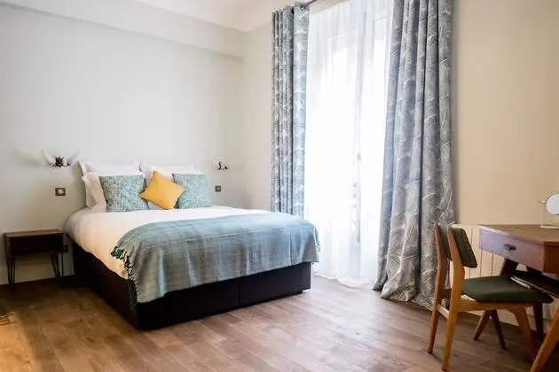 Deluxe Tek Büyük veya İki Ayrı Yataklı Oda