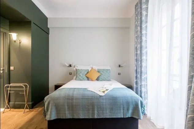 Deluxe Tek Büyük veya İki Ayrı Yataklı Oda