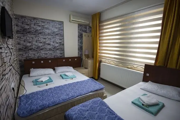 Üç Kişilik Oda