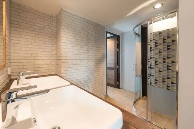4-Bed Female Dormitory with Shared Bathroom