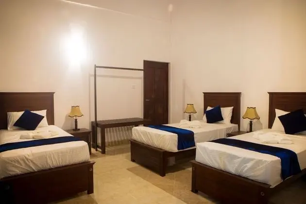 Deluxe Üç Kişilik Oda, Birden Çok Yatak, Sigara İçilmez, Bahçe Manzaralı
