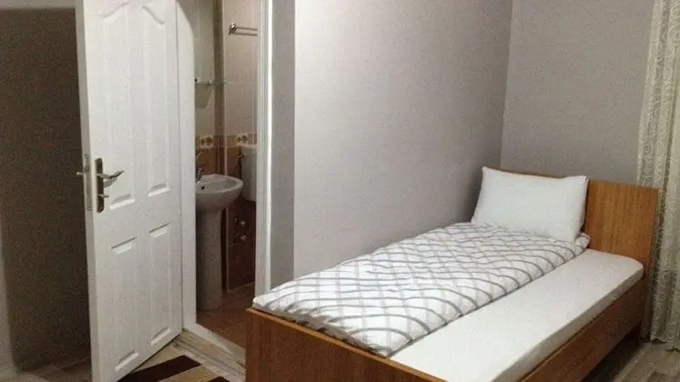 Üç Kişilik Oda
