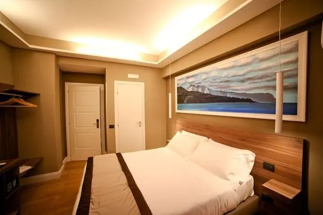 Deluxe Tek Büyük veya İki Ayrı Yataklı Oda