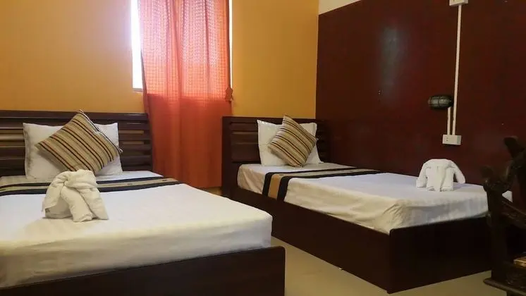 Triple Room (Shared Bathroom)