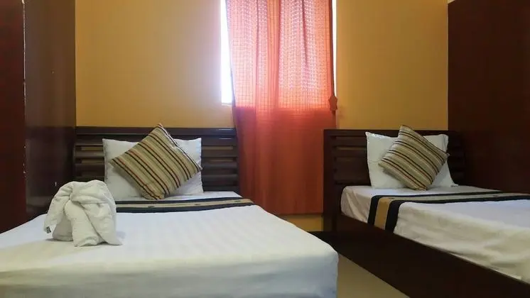 Triple Room (Shared Bathroom)