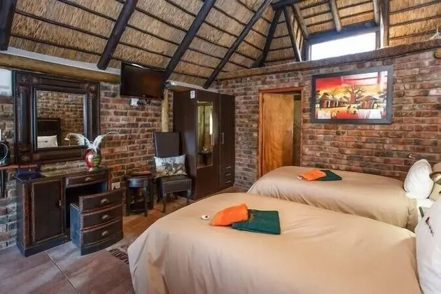 Double Bed Thatched Chalets