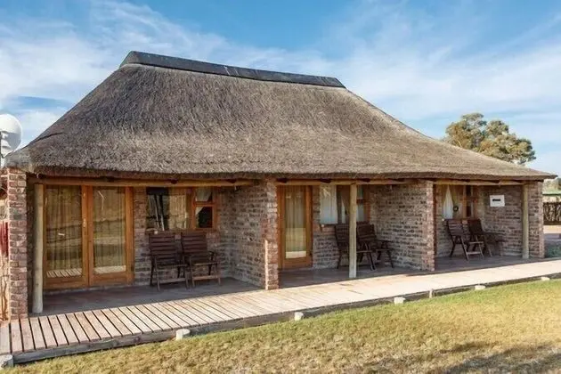 Double Bed Thatched Chalets