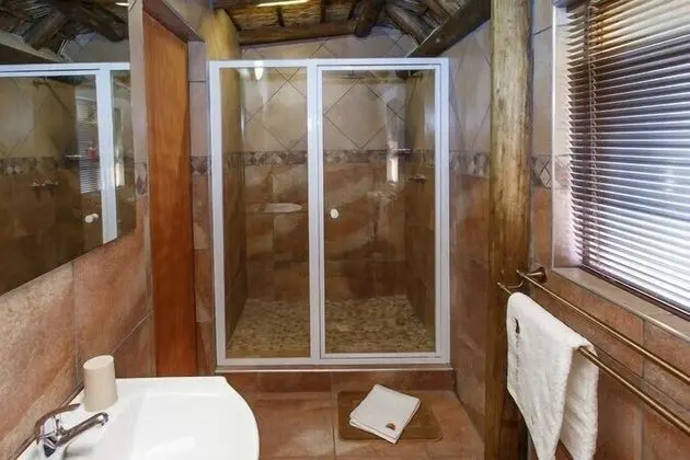 Double Bed Thatched Chalets