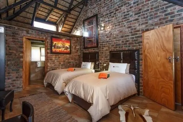Twin Bed Thatched Chalets