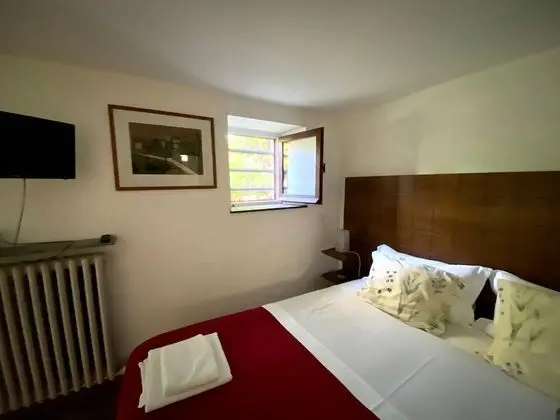 Tek Büyük veya İki Ayrı Yataklı Oda, Bahçe Manzaralı