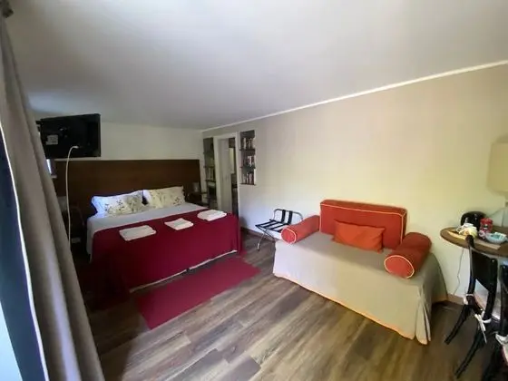 Tek Büyük veya İki Ayrı Yataklı Oda, Bahçe Manzaralı