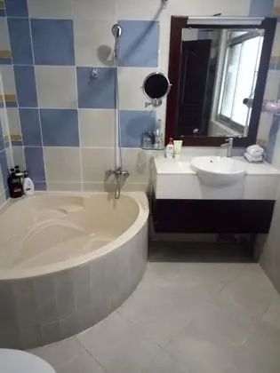 Deluxe Tek Büyük veya İki Ayrı Yataklı Oda