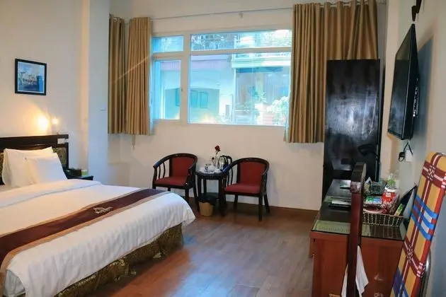 Deluxe Tek Büyük veya İki Ayrı Yataklı Oda