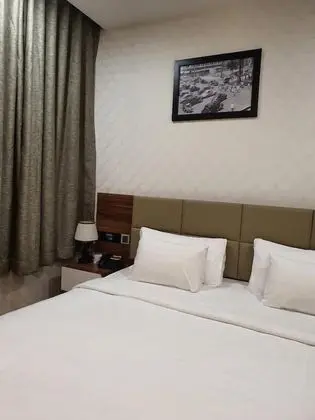 Deluxe Tek Büyük veya İki Ayrı Yataklı Oda