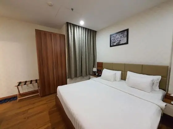 Deluxe Tek Büyük veya İki Ayrı Yataklı Oda