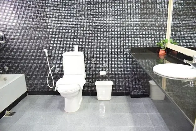 Deluxe Tek Büyük veya İki Ayrı Yataklı Oda