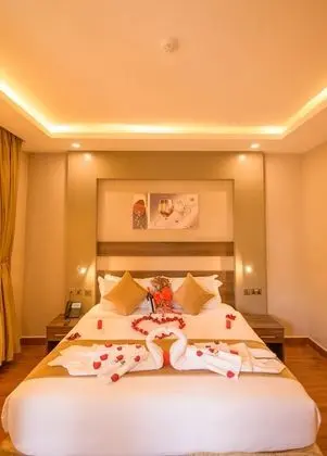Deluxe Tek Büyük veya İki Ayrı Yataklı Oda